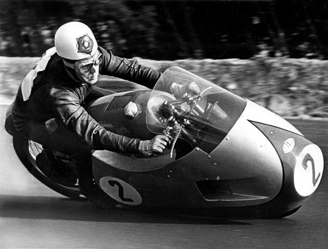 Geoff Duke on the 500 Gilera 4-cylinder with full fairing